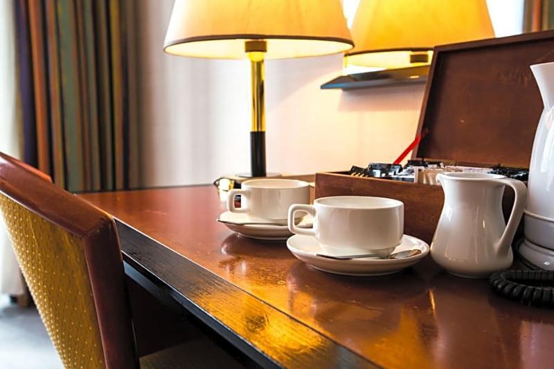 Rahat Palace Hotel Almaty Bagian luar foto A tea tray in a hotel room